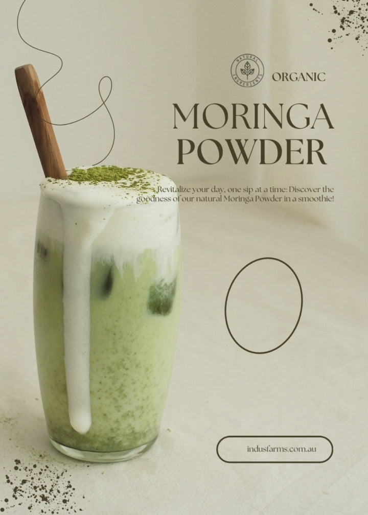 chilled moringa powder smoothie glass with ice and cream