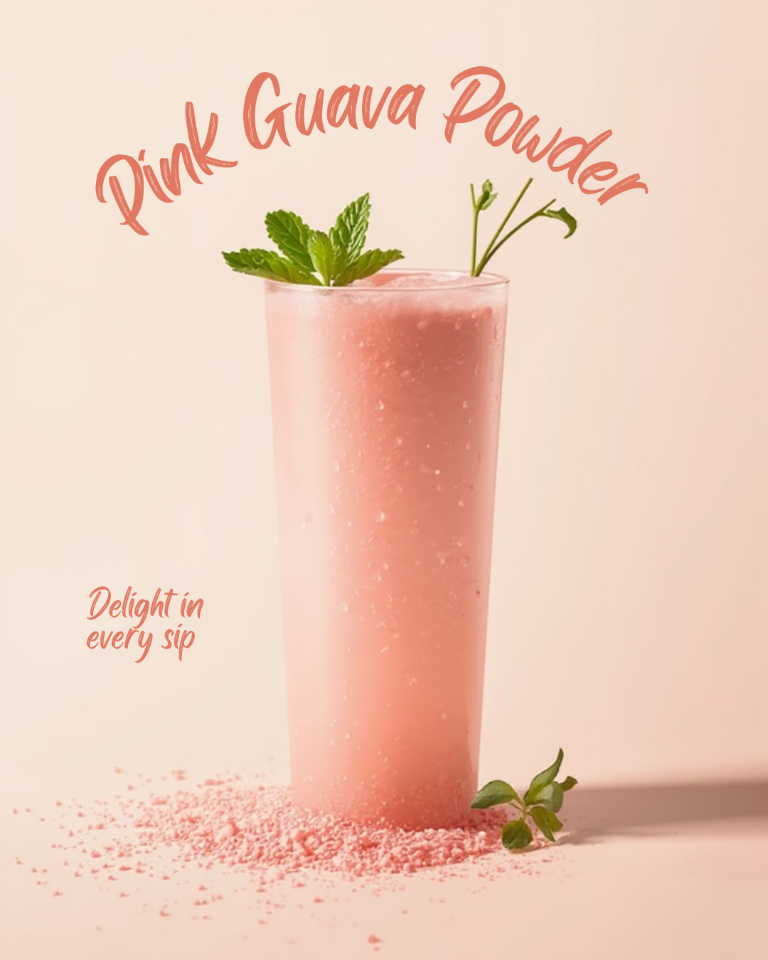 Pink smoothie with pink guava powder and mint leaves on a light pink background