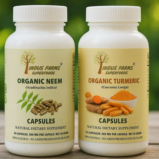 Two bottles of Indus Farms Superfoods turmeric neem organic capsules