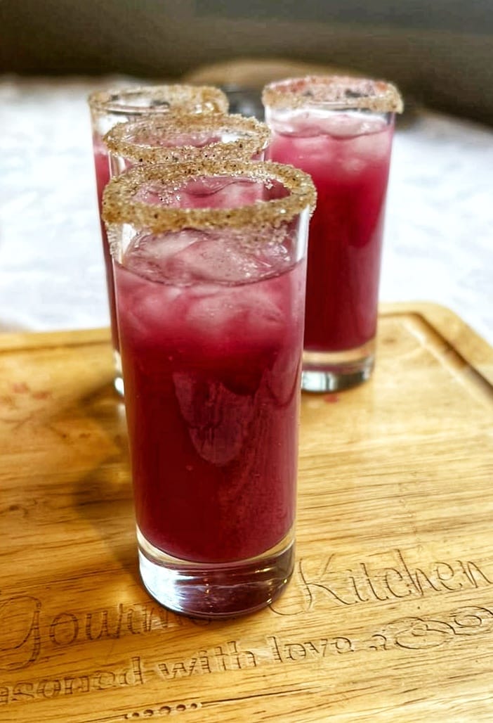 Plum Powder mixed in a refreshing purple beverage, jamun shots