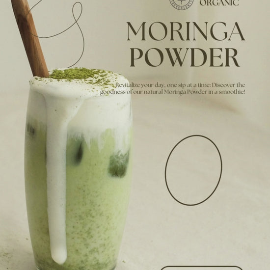 chilled moringa powder smoothie glass with ice and cream